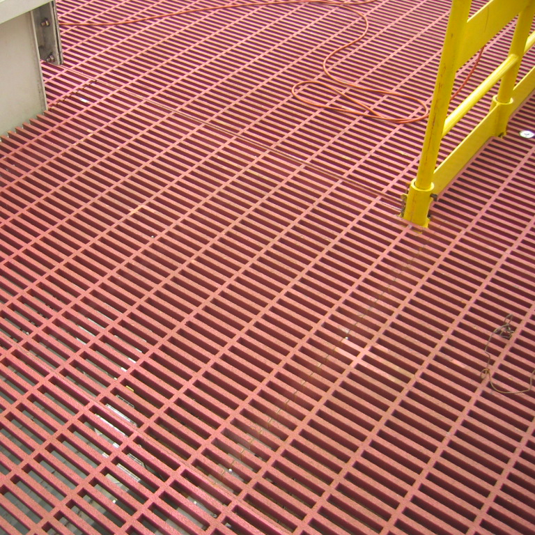 Red Phenolic GRP Grating installed on a maintenance platform