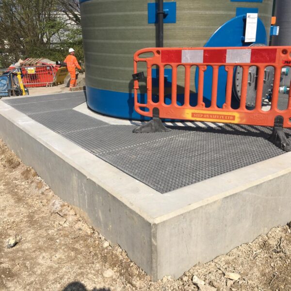 Grey bund floor surrounding a bund tank at Northern Thames Water