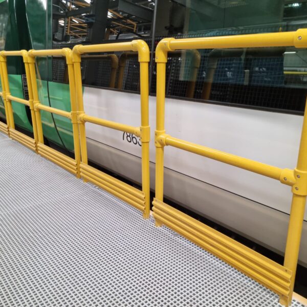Removeable section of GRP Handrail in a train depot